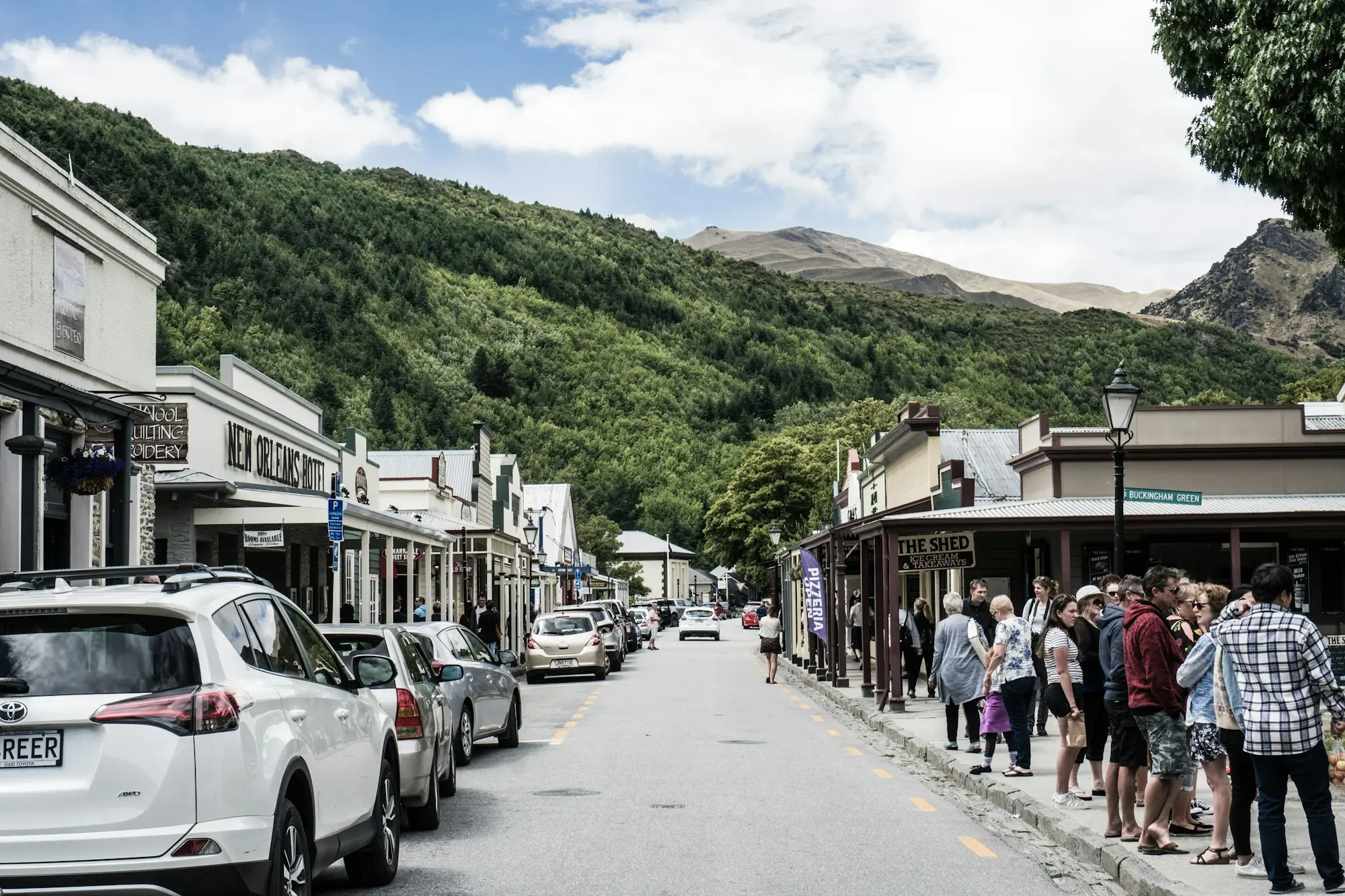 People strolling a market street in the hills