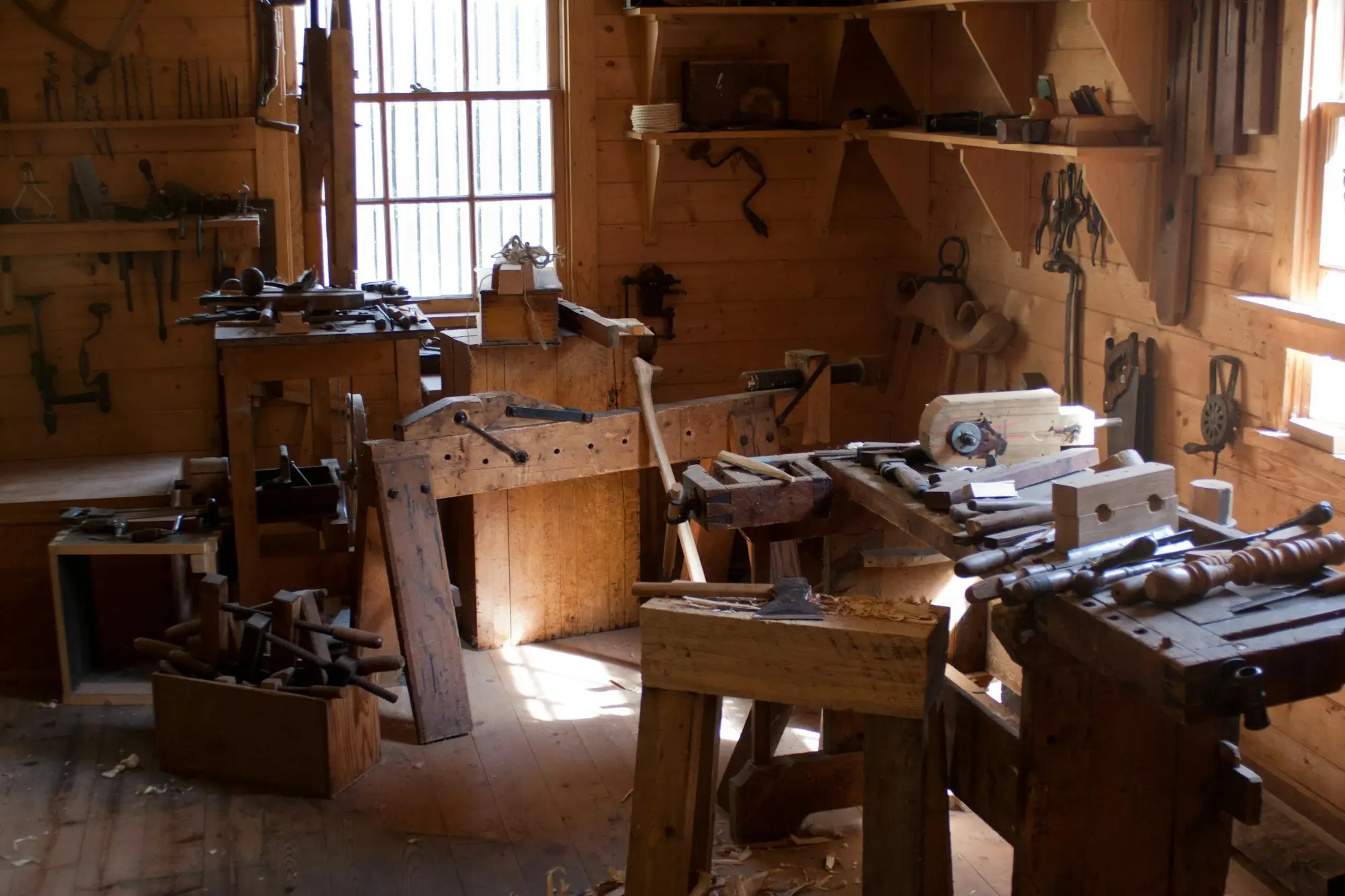 Sunlit timber workshop with benches and hand tools, the kind of small trading business that relies on a working-capital facility